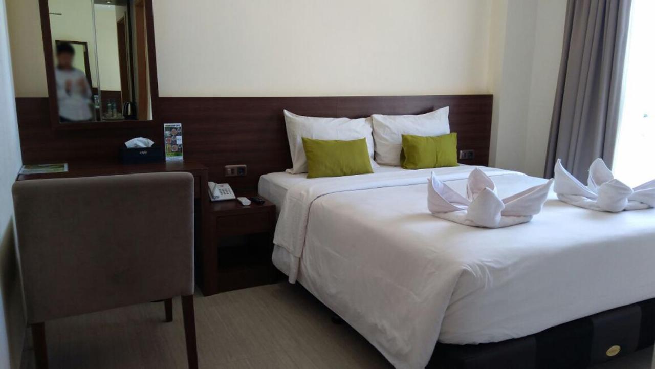 Green Eden Hotel Manado Bilik gambar